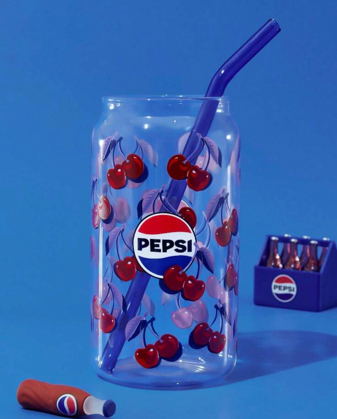 Cherry pepsi glass with straw