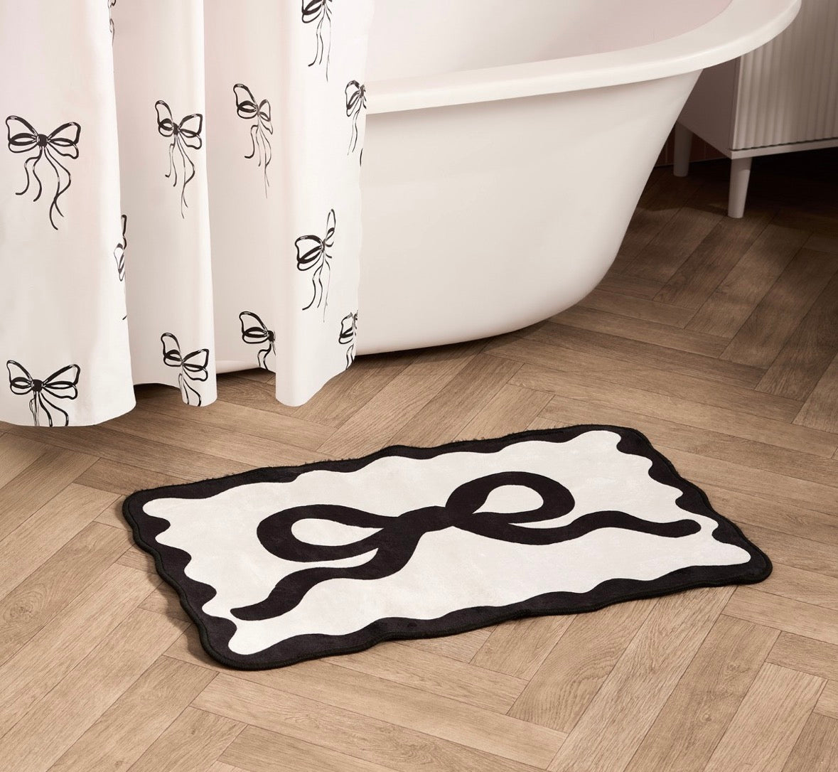 Bow bath mat
