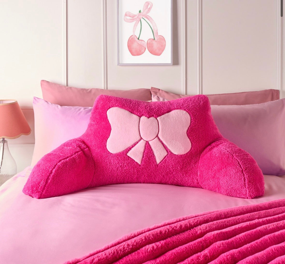 Pink bow cuddle cushion