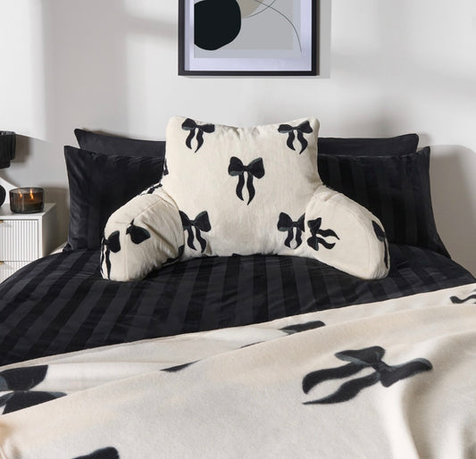 Bow cuddle cushion