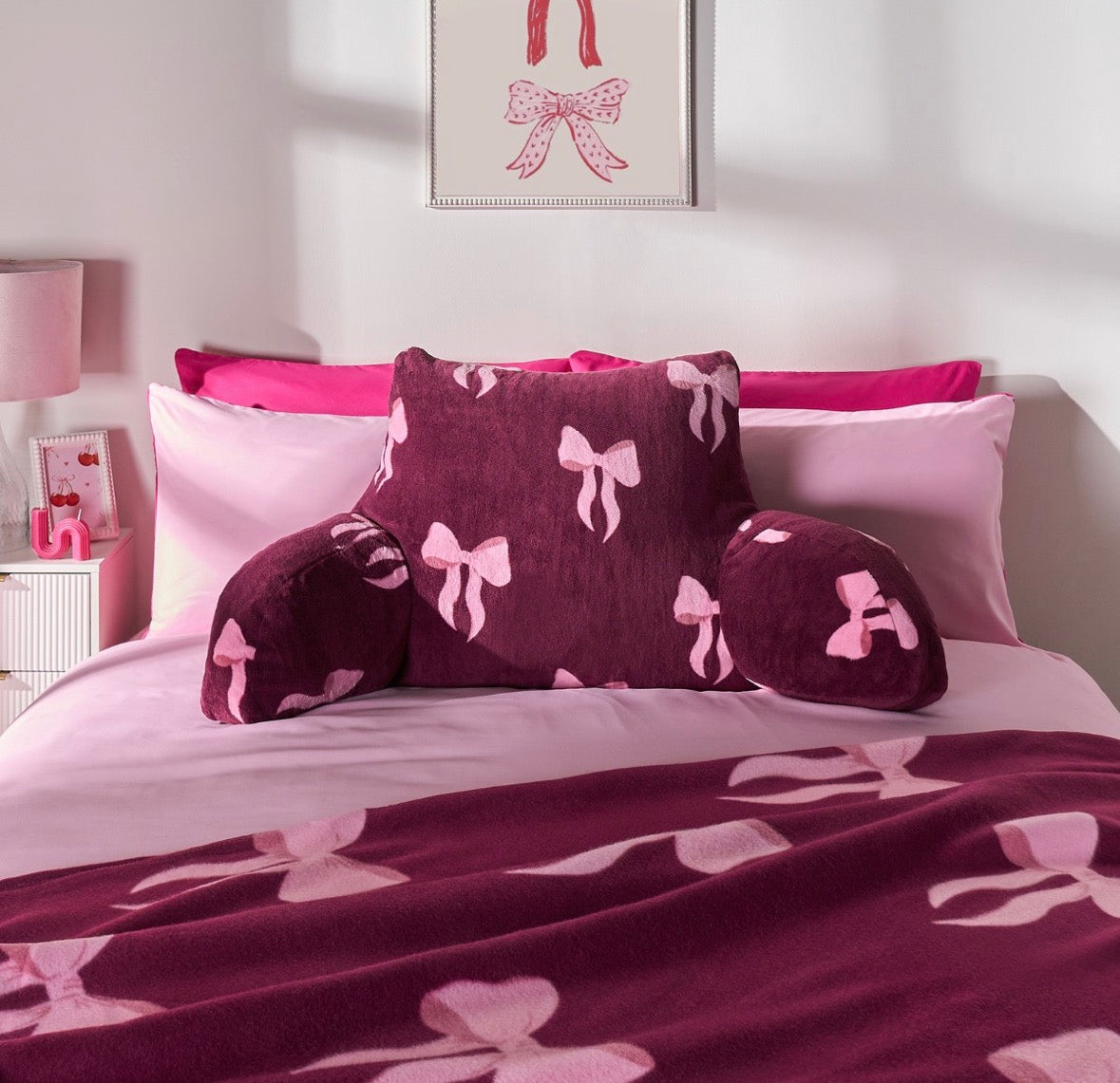 Bow cuddle cushion